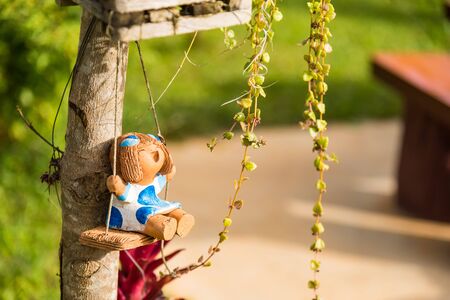 Baby dolls made from clay in garden.Thailandの写真素材