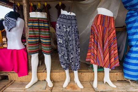 Colorful of handmade fabric in the market in countryside of Thailand