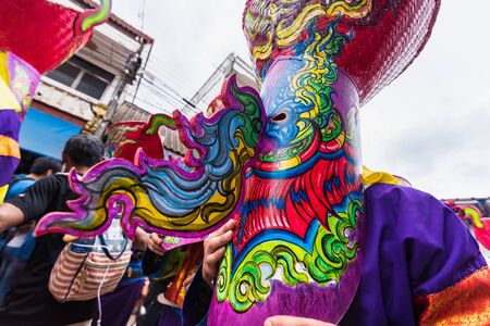 Loei province ,Thailand -  July, 06, 2019 : Ghost Festival Phi Ta Khon.People are enjoy dressing with colorful clothes made from wood handmake  in Loei province ,Thailandのeditorial素材