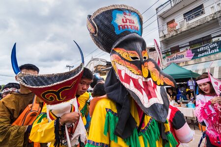 Loei province ,Thailand -  July, 06, 2019 : Ghost Festival Phi Ta Khon.People are enjoy dressing with colorful clothes made from wood handmake  in Loei province ,Thailandのeditorial素材
