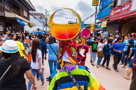 Loei province ,Thailand -  July, 06, 2019 : Ghost Festival Phi Ta Khon.People are enjoy dressing with colorful clothes made from wood handmake  in Loei province ,Thailandのeditorial素材