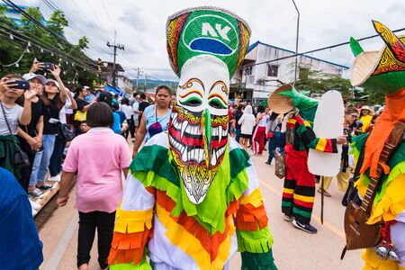 Loei province ,Thailand -  July, 06, 2019 : Ghost Festival Phi Ta Khon.People are enjoy dressing with colorful clothes made from wood handmake  in Loei province ,Thailandのeditorial素材