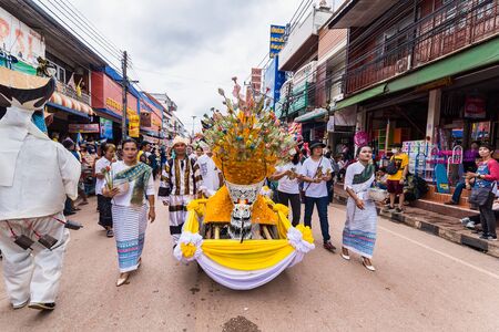 Loei province ,Thailand -  July, 06, 2019 : Ghost Festival Phi Ta Khon.People are enjoy dressing with colorful clothes made from wood hand make  in Loei province ,Thailandのeditorial素材