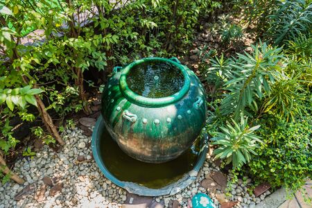Fountain decoration in the garden made by Clay pottery ceramicの写真素材