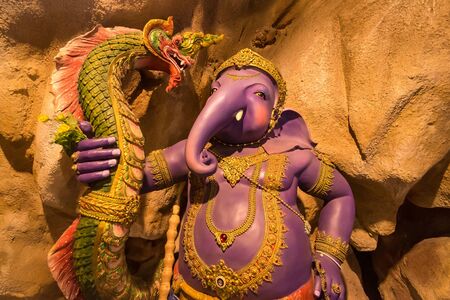 Indian Hindu God Lord Ganesha Statue made of clay and coated with ceramic colors, handmade artistic effects, Beautiful artifacts. Happy Ganesh Chathuthi. He also known as Lord Vinayakaの写真素材