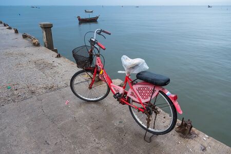 Chon Burii, Thailand - October, 06, 2019  : bicycle on Bang Saen Pier in Chon Burii, Thailand