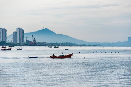 Chon Burii, Thailand - October, 05, 2019 : Fishing boats floating in the sea over cloudy sky,Chon Burii, Thailandのeditorial素材
