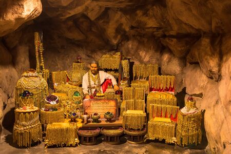 Chon Burii, Thailand - October, 06, 2019  : God of wealth In the cave at Chon Burii, Thailandのeditorial素材