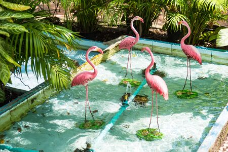 The flamingo bird sculpture used to decorate the garden