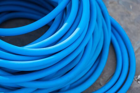 The hose for the spray in the field.の写真素材