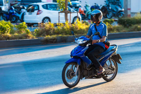 Bangkok, Thailand - May, 30, 2020 : Motion Blurred panning photo of Unidentified name people riding...