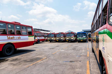 Bangkok, Thailand - April, 01, 2020 : Public bus parking in the garage at Bangkok, Thailand.のeditorial素材