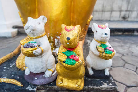 A gold stone statue of the rat.rat as the servants of Ganeshaの写真素材