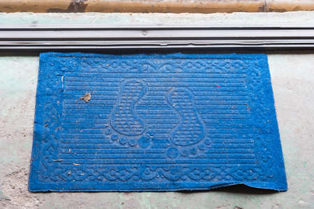 Welcome mat on the floor background.の写真素材