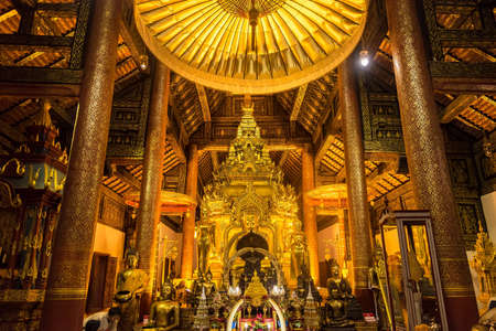 Chiangmai, Thailand - October, 10, 2020 : Golden buddha statue at Wat Phra That Si Chom Thong Worawihan at twilight, Chiang Mai, Thailand.のeditorial素材