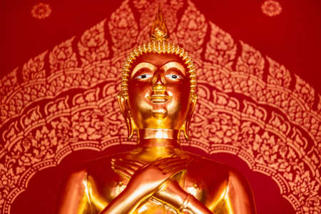 Chiangmai, Thailand - October, 10, 2020 : Golden buddha statue at Wat Phra That Si Chom Thong Worawihan at twilight, Chiang Mai, Thailand.のeditorial素材