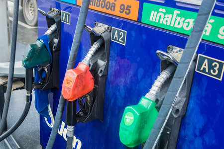 Bangkok, Thailand - November, 01, 2020 : Close up fuel nozzles in PTT gas station at Bangkok, Thailandのeditorial素材