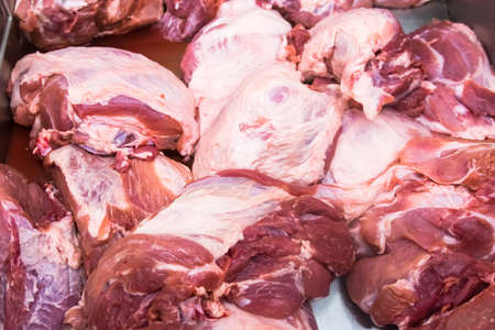 Raw meat piece of pork or beef close up top view