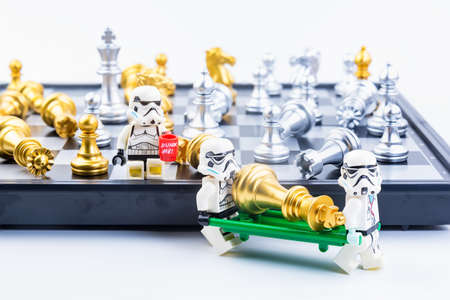 Bangkok, Thailand - November, 13, 2020 : Lego Star Wars is helping to carry chess pieces off the...