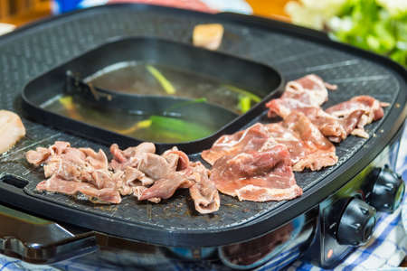 Raw wagyu beef Grill on the electric grill.の写真素材
