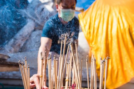 Ayutthaya, Thailand - December, 04, 2020 : Incense use for Worship And sacred things, According to ancient beliefs at Yai Chai Mong Kol temple,Ayutthaya, Thailandのeditorial素材