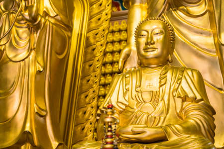 Nonthaburi, Thailand- March 08, 2021 : Golden buddha image, Chinese Temple in Leng Noei Yi 2 or Mangkon Temple in Nonthaburiのeditorial素材