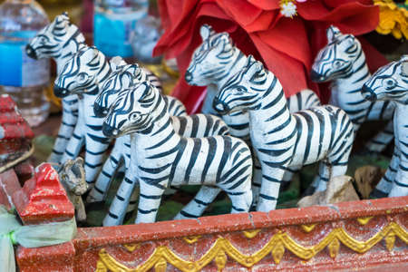 Zebra statue sacrificial offering for thai god ,god toy,pray to thai god.Thailandの写真素材