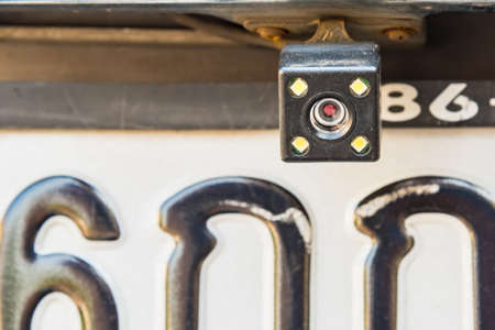 Bangkok, Thailand- March 01, 2021 : Rear car rear view camera close up for parking assistance. Concept of safety car driving while parking process. Assist device equipment in modern cars.のeditorial素材