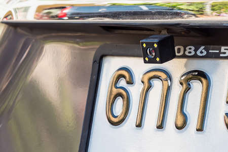 Bangkok, Thailand- March 01, 2021 : Rear car rear view camera close up for parking assistance. Concept of safety car driving while parking process. Assist device equipment in modern cars.のeditorial素材