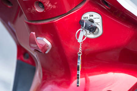 Bangkok, Thailand- March 01, 2021 : Motorbike key in its ignition keyhole at Bangkok, Thailandのeditorial素材