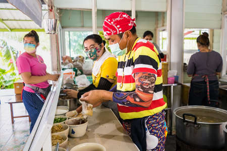 Bangkok, Thailand - May, 01, 2021 : Unidentified name man cooking noodles for selling at Bangkok, Thailand.のeditorial素材