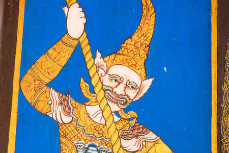 Nonthaburi, Thailand- March, 27, 2021 : Colorful painting of a guardian angel at the gate of Praramai Temple on Koh Kret, Nonthaburi, Thailandのeditorial素材