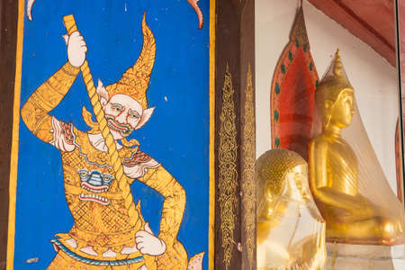 Nonthaburi, Thailand- March, 27, 2021 : Colorful painting of a guardian angel at the gate of Praramai Temple on Koh Kret, Nonthaburi, Thailandのeditorial素材