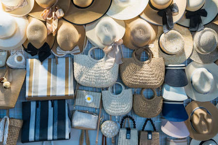 Beautiful hat shop and a beautiful handmade woven bag in Night market Thailand.のeditorial素材