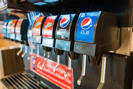Bangkok, Thailand - May, 05, 2021 :Pepsi machine for refill self service in Kentucky Fried Chicken or KFC fast food restaurant at Bangkok, Thailandのeditorial素材