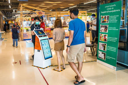 Bangkok, Thailand - May, 05, 2021 :Temperature Screening Point at the entrance of Tesco Lotus.Front...