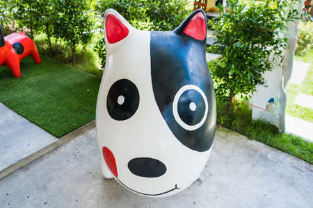 Brightly colored dog statue Used to decorate the shopの写真素材
