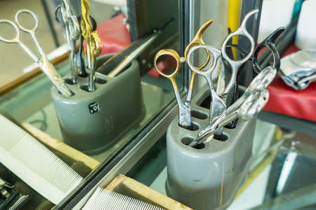 Bangkok, Thailand-June, 11, 2021: Barber scissors in barber shop at Bangkok, Thailandのeditorial素材