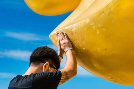Ang Thong, Thailand-June, 19, 2021 : People to touch The Big Buddha's finger. The Big, Great Buddha...