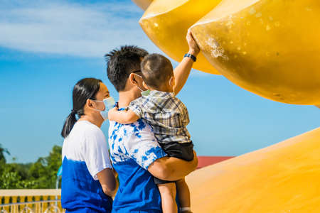 Ang Thong, Thailand-June, 19, 2021 : People to touch The Big Buddha's finger. The Big, Great Buddha of Thailand is one of the main pilgrim and tourist destination in Ang Thong, Thailandのeditorial素材
