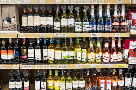 Bangkok, Thailand -July , 15, 2021 : Shelves with variety of alcohol for sale in Big C supermarket at Bangkok, Thailandのeditorial素材