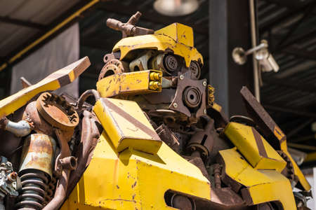 Bangkok, Thailand -July , 15, 2021 : Bumblebee transformers robot model made from scrap metal Set up a show in front of a car wash at Bangkok, Thailandのeditorial素材