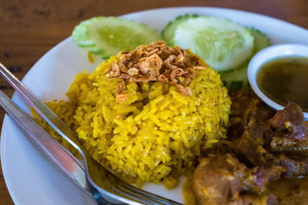 Beef Biryani or Curried rice and beef - Thai-Muslim version of Indian biryani, with fragrant yellow rice and beefの写真素材