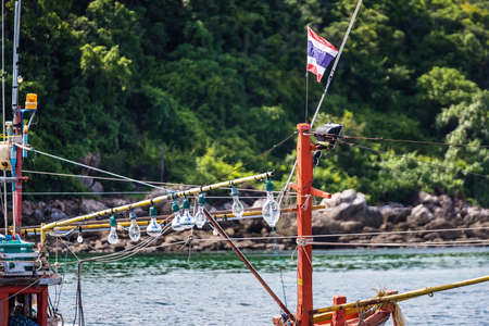 Chon Buri, Thailand - October, 02, 2021 : Fishing boat in the sea at Tawaen Beach, Koh Larn, Chonburi, Thailand.のeditorial素材