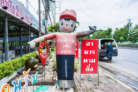 Bangkok, Thailand - October, 17, 2021 : Inflatable dolls are used to bring customers to a noodle shop in Bangkok, Thailand.のeditorial素材