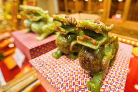 Pair of jade stone Pixiu Dragon Feng Shui sculptures. Pixiu are a Chinese lucky animalの写真素材