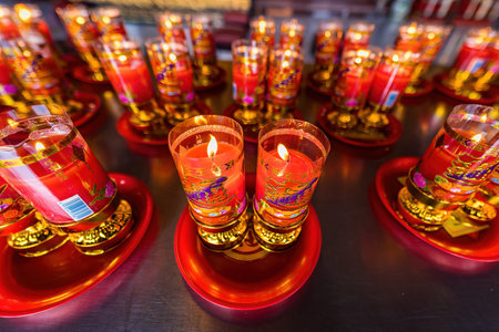Bangkok, Thailand - December, 20, 2021 : Praying and meditation with burning candle on Chinese temple in Wat Leng Nei Yee 2 Temple at Bangkok, Thailand.のeditorial素材