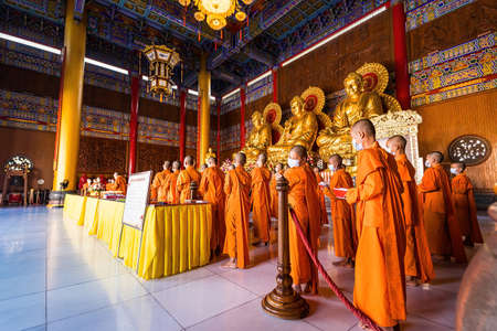 Bangkok, Thailand - December, 20, 2021 : Chinese Monk Doing Buddhist rituals At Leng Noei Yi 2 or Mangkon Temple in Bangkok, Thailand.のeditorial素材