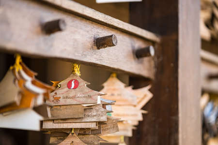 Chiang Rai, Thailand - January, 11, 2021 :  12 zodiac wooden planks in the shape of a house donation Label in Cherntawan International Meditation Center, Chiang Rai, Thailand.のeditorial素材