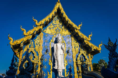 Chiang Rai, Thailand - January, 09, 2022 :  Thai traditional church is the art of Wat Rong Suea Ten at Chiangrai Thailand.のeditorial素材